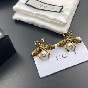 Markendesigner goldplattiert silberisch plattiert Charm Stud Ohrring Luxus Buchstaben Stahl Siegel Kupfermaterial Ohrring eingelegtes Kristallperlenohrhohr Hochzeit Schmuck Schmuck