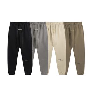 Moda Mens Designer ESS Homens Mulheres Cor Sólida Calça Calças Hip Hop Motion Calças para Masculino Casual Corredores Tamanho