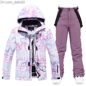 Fatos de treino femininos fato de neve feminino 10k conjunto de fato de esqui à prova de água roupas de snowboard ao ar livre casaco de gelo de inverno + calças para meninas Z230726