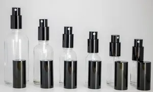 Garrafas de spray de vidro transparente lote de tampa preta 10ml 15ml 20ml 30ml 50ml 100ml garrafas recarregáveis portáteis com atomizador de perfume atacado