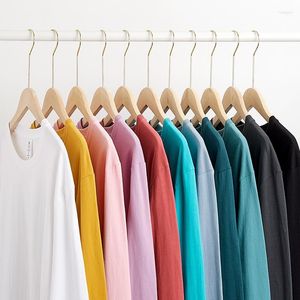 Camisetas masculinas primavera e outono soltas camiseta de manga comprida com gola redonda para homens e mulheres camisa branca de algodão puro