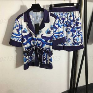 Torowe garnitury designerska koszula 2 -częściowy Kobiety Celadon Print Kat Town Tested Lapel Short Sleeve koszule z wysokim pasażem