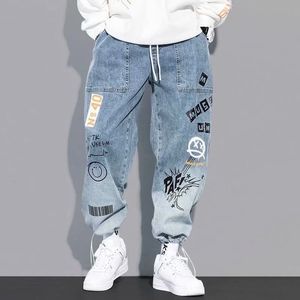 Jeans masculinos jeans outono carta impressão baggy hip hop homens calças de carga streetwear desenhos animados graffiti cordão denim calças 230725