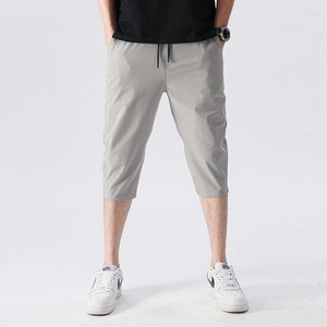 Men's Shorts Wersja Koreańska Summer Slim Fit Small Foot Sport Sports Casual Pants Chłopcy Silk Szybki suszenie 7-punktowy wysoki elastyczność