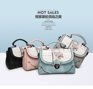 2023 primavera/verão novas bolsas femininas fosco para noite com fivela estilo retrô bolsa de mão de cor sólida versátil bolsa de um ombro oblíqua transversal bolsa pequena atacado