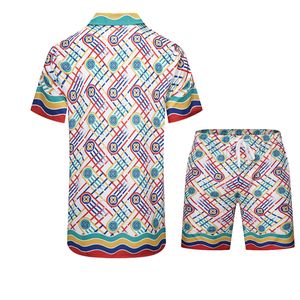 Fatos de treino masculinos coloridos anel fivela impressão fina seda casablanca malha shorts conjunto de camisa de bolso homens mulheres havaí praia praia praia surf short terno 230725