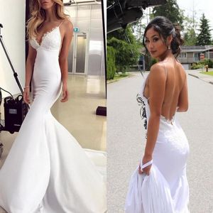 2018 Cheap Simple White Spaghetti Lace Appliques Wedding Dresses Sexy Backless Beach Mermaid Sweep Train Gorgeous Bridal Gowns184o