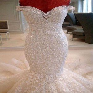 2019 Fantastisk spets sjöjungfru bröllopsklänningar från axel sveptågsapplikationer Dubai arabisk stil brudklänningar skräddarsydd263d