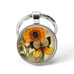 Portachiavi Catene a farfalla Ciondolo animale Porta anello Art Po Cabochon in vetro Pendent Sier Portachiavi Gioielli di moda Regalo Drop Delivery Dhuvb