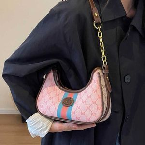 2023 Nova fábrica de vendas diretas de alta qualidade Este ano popular bolsa feminina rosa nas axilas high-end dumpling corrente pendulares saco crossbody