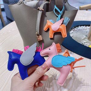 Keychains Lanyards Wholesale Luxury PU Leather Angel Wings Horse Shape Keychain Pendant for Ladies Mini Pony Rodeo Bag Charm Accessories Ornament T231225
