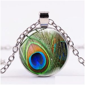 Collane con ciondolo Collana con dichiarazione di piume classiche vintage Simbolo di pavone verde Cabochon di cristallo Art Long Boho Jewelry Drop Delivery Dhxe0