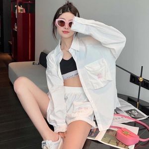 Summer women's letter print loose long-sleeved shirt and elastic shorts set, acrylic fabric comfortable and breathable, loose version of casual fashion.