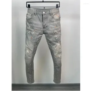 Jeans da uomo Fashion High Street Denim Pantaloni in tessuto Trendy Casual MotoBiker Hole Spray Painted A606