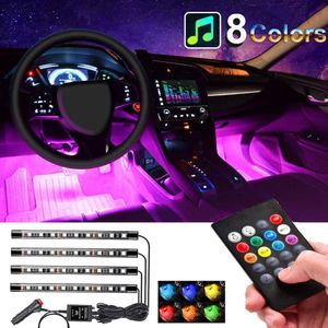 Luci interne per auto 4 pezzi Lampada al neon a incandescenza per atmosfera da pavimento Striscia musicale multicolore Kit di illuminazione decorativa sotto il cruscotto231Q