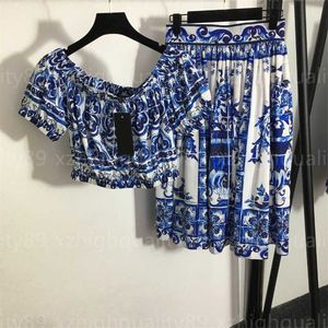 Terno feminino azul duas peças conjunto de roupas de verão moda impressão em torno do pescoço manga curta topo solto respirável saia plissada saias de comprimento médio ternos de grife feminino 2 peças