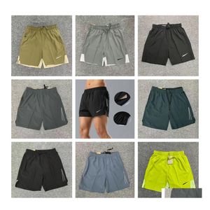 Mäns shorts mesh snabbt torrt men knä män och kvinnor alla andas tunna stretch basket kör korta byxor droppleverans kläder otwck