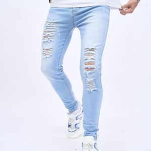 Mäns jeans våren män streetwear rippade hiphop smala blyertsbyxor manliga snygga hål avslappnade stretch denim byxor