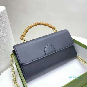 2023-Design Handbag Women's bamboo handle crossbody bag Luxury Designer Bag Vintage Printed flap shoulder Leather Handbag