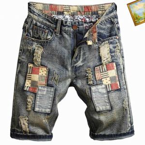 2023 Designer Mens Jeans Short Street Purple para Homens Calças Bordadas Femininas Oversize Rasgado Patch Hole Denim Reta Moda Feminina Streetwear Slimua9z