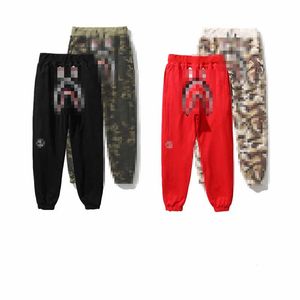 Calças de patchwork de camuflagem de cabeça de tubarão para outono novas Leggings masculinas dupla face casuais Calças APE de primavera