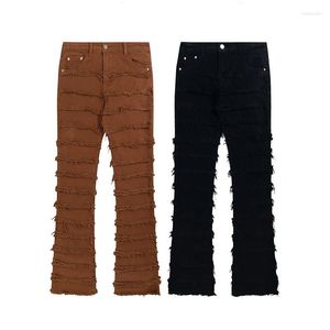 Męskie dżinsy High Street Harajuku Tassel strzępione proste workowate spodnie dla mężczyzn kobiety