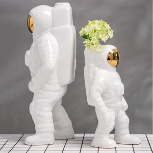 Vases Nordic Style Ceramic Vase White Silver Space Man Sculpture Astronaut Cosmonaut Model Home Ornament 230731