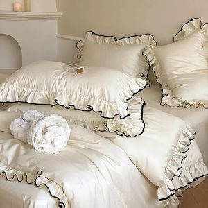 Sängkläder sätter lyx 1000tc egyptisk bomull fransk prinsessa bröllop sängkläder set ruffles svart kant jacquard täcke täcke lakan kuddar 231101