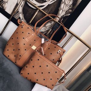 Designer bag Womens fashion portable shopping bag Large capacity waterproof mommy bag Womens highend leather handbag Commuter wind Shoulder bag