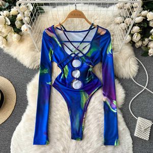 Nxy ihålig ut sexiga palysuits långärmad v hals cross design rompers mode kvinnor blå strand slim bodysuits 230328