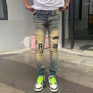 Мужские джинсы Уличная мода Мужские пуговицы Ретро-стиранные синие эластичные узкие брюки с рваными нашивками Дизайнерские брюки в стиле хип-хоп