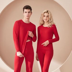 Kadın pijama 2023 Sonbahar ve kış düz renk termal iç çamaşırı erkekler kadın pantolon setleri dip gömlek yuvarlak