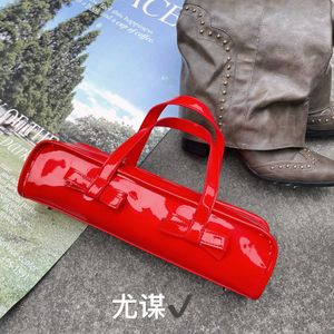 Trendy and Cool Personality Bow Knot Bright Face Oil Wax Leather Stick Tote Bag Long Strip Pillow Bag Hand in Hand Small Bag 231102