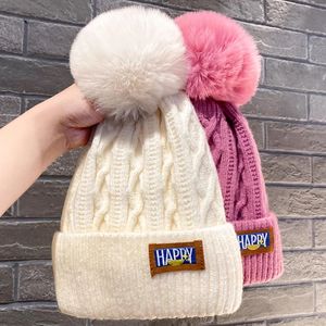 Berretti BeanieSkull Cappello da donna di alta qualità Aggiungi pompon foderati in pelliccia Cappelli invernali in lana alla moda per berretto lavorato a maglia caldo e spesso streetwear 231101