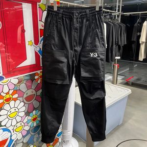 Pantaloni da uomo Y3 Stampa Tasca tagliata Casual Cargo Estate Marchio di lusso Tendenza Pantaloni sportivi larghi con piedi 231101