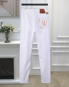 Mäns jeans kvinnor designer pant sport brev jacquard färgade brev jeans vår sommar casual byxor vit storlek 29-40