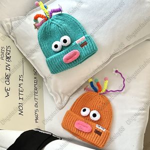 Cute cute cute funny designer brand parent-child cashmere knitted woolen hat autumn and winter face small luxury cartoon warm ear hat new parent-child 6A