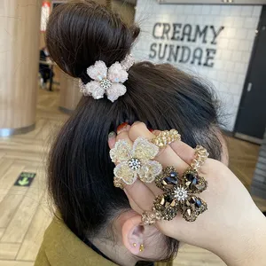 Accessori per capelli di lusso all'ingrosso Fasce per capelli con fiori di cristallo di moda per donne Ragazze Supporti per coda di cavallo Corde per capelli Fasce per capelli barocchi