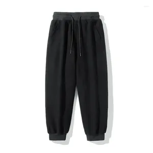 Pantaloni da uomo da uomo addensati pantaloni in piumino d'anatra bianco allacciati moda coreana vintage casual bello inverno maschile caldo sport allentati