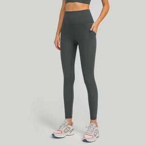 Höga midja yogabyxor med fickan LU-134 Solid Women Elastic Running Sports Leggings Fitness Training tight Non See Through Workout Trousers Butt Lift