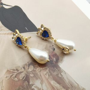 Collana di colori di design Bracciale di diamanti alla moda con perle Orecchini pendenti esagerati Set di gioielli con ago in sier di alta qualità