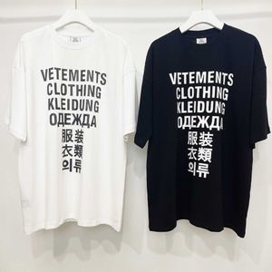 T-shirt da uomo 22SS Stampa di lettere in sette lingue in bianco e nero Loose Fit Uomo e donna Casual manica corta VTM T230403