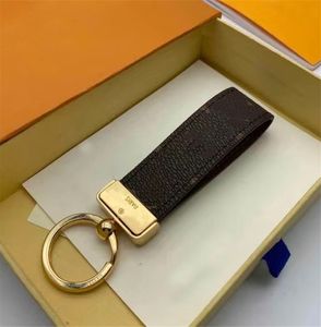 Portachiavi di alta qualità Classico squisito designer di lusso Portachiavi per auto Lettera in lega di zinco Cordino unisex Oro nero Metallo Piccoli gioielli Dermico di alta qualità