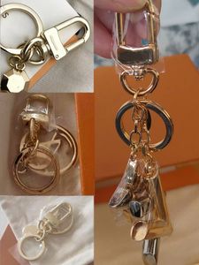 High quality Brand Designer Keychain Fashion Purse Pendant Car Chain Charm Bag Keyring Luxury Classic Mens Womens Letter Gold Black Buckle Metal accessories 0028