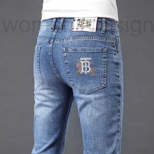 Jeans masculinos designer de luxo europeu high-end jeans para homens primavera e verão marca na moda magro pé pequeno elástico casual personalidade calças compridas estilo fino mm