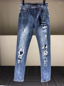 Mäns jeans vintage blå 2023 mode rippade mager stretch denim byxor höstdesigner orolig förstörde trendiga byxor