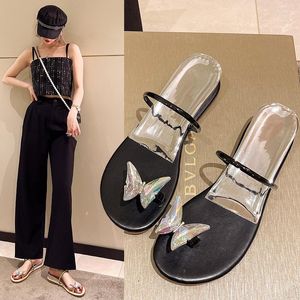 Terlik Kelebek klipsli ayak parmağı sandaletleri kadınlar için 2023 yaz peri tarzı basit düşük topuk moda Korece