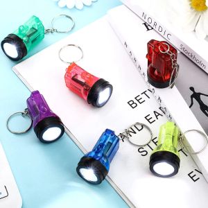 Schlüsselanhänger-Taschenlampen, Mini-Taschenlampen-Schlüsselanhänger, LED-Ketten, tragbare Hand-Kunststoff-Schlüsselanhänger für Cam-Partygeschenke, Drop-Lieferung, Amejf