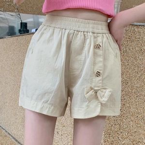 Shorts flickor avslappnad elastisk midja bekväm knapp båge detalj sommar bomull asymmetri korta byxor kläder 8 10 12 13 14 år