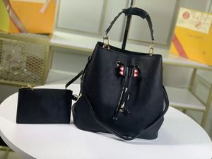 Designers de luxo Sacos de ombro de balde feminino com tela de lona Bolsa de couro genuíno Bola de couro ajustável Moda BB Carta de gravação